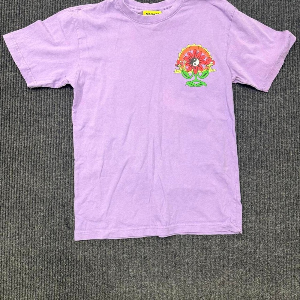 Market brand purple t-shirt with red flower graphic featuring a yin-yang